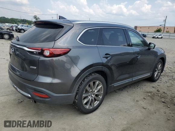 2018 Mazda CX-9 Grand Touring z VIN JM3TCBDY9J0208533, wystawiony jako Copart lot #59854635 z przebiegiem 90 263 mil mil oraz Szkoda całkowita • Salvage title. Historia ofert i sprzedaży dostępna na DreamBid. Obrazek 3.
