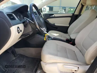 2012 Volkswagen Jetta Sedan SE w/Convenience with VIN 3VWDX7AJ1CM454317, listed as a Copart auction lot 48673205 with 136,971 mi miles and Salvage Title. Bid and sale history available at carsss.com. Image 7.