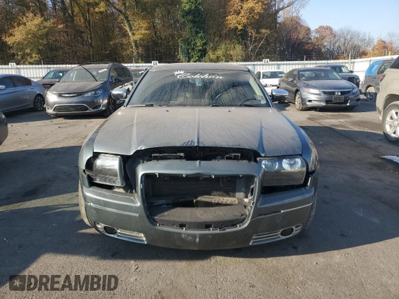 2005 Chrysler 300 with VIN 2C3JA53GX5H563815, listed as a Copart auction lot 81886344 with 144,630 mi miles and Salvage Title. Bid and sale history available at carsss.com. Image 5.