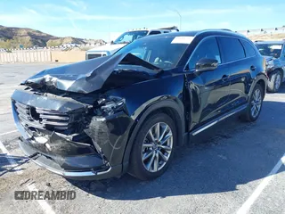 2018 Mazda CX-9 Grand Touring z VIN JM3TCADY8J0221221, wystawiony jako IAAI lot #41644721 z przebiegiem 41 510 mil mil oraz . Historia ofert i sprzedaży dostępna na DreamBid. Obrazek 17.