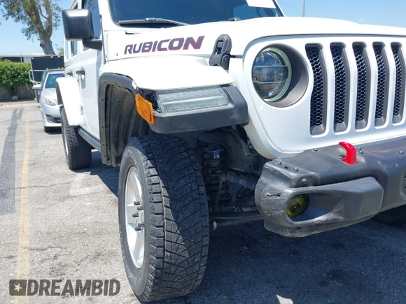 2018 Jeep Wrangler Unlimited Rubicon with VIN 1C4HJXFN8JW215023, listed as a IAAI auction lot 42227099 with 62,195 mi miles and . Bid and sale history available at DreamBid. Image 6.