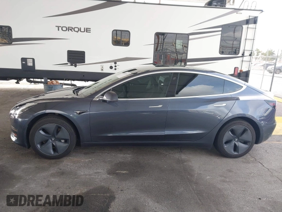 2020 Tesla Model 3 Standard Range Plus with VIN 5YJ3E1EA8LF743405, listed as a IAAI auction lot 41923592 with 81,901 mi miles. Bid and sale history available at carsss.com. Image 14.