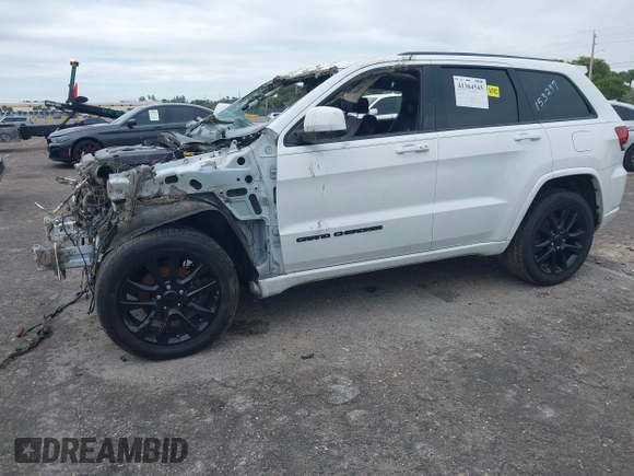 2018 Jeep Grand Cherokee Laredo E with VIN 1C4RJEAG4JC153297, listed as a IAAI auction lot 41364545 with Not provided miles and . Bid and sale history available at DreamBid. Image 17.