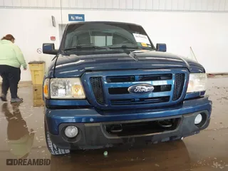 2011 Ford Ranger XLT with VIN 1FTLR4FE3BPA52049, listed as a IAAI auction lot 41394422 with 112,080 mi miles. Bid and sale history available at carsss.com. Image 12.