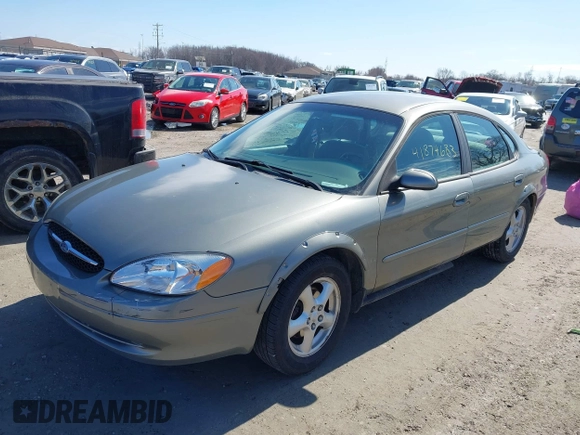 2002 Ford Taurus SES Standard with VIN 1FAFP55UX2G272540, listed as a IAAI auction lot 41874683 with 199,073 mi miles. Bid and sale history available at carsss.com. Image 2.
