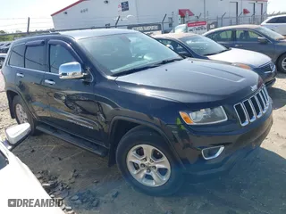 2014 Jeep Grand Cherokee Laredo with VIN 1C4RJEAG1EC263584, listed as a IAAI auction lot 41936615 with 391,334 mi miles. Bid and sale history available at carsss.com. Image 1.