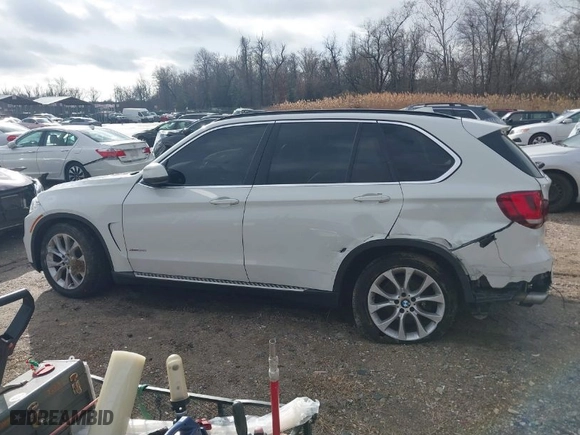 2016 BMW X5 xDrive35i with VIN 5UXKR0C58G0S86775, listed as a IAAI auction lot 41106196 with 104,837 mi miles. Bid and sale history available at carsss.com. Image 14.