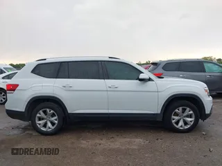 2018 Volkswagen Atlas SE с VIN 1V2DR2CA1JC587959, выставлен на аукционе IAAI как лот 42190292 с пробегом 93 832 миль миль и . История ставок и продаж доступна на DreamBid. Изображение 13.