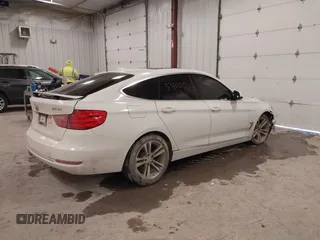 2016 BMW 3 Series GT 328i xDrive with VIN WBA8Z5C54GG500965, listed as a IAAI auction lot 41254000 with 115,672 mi miles. Bid and sale history available at carsss.com. Image 4.