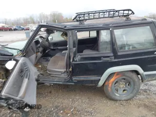 1998 Jeep Cherokee Sport z VIN 1J4FJ68S7WL264849, wystawiony jako IAAI lot #41931068 z przebiegiem Nie podano mil oraz . Historia ofert i sprzedaży dostępna na DreamBid. Obrazek 14.