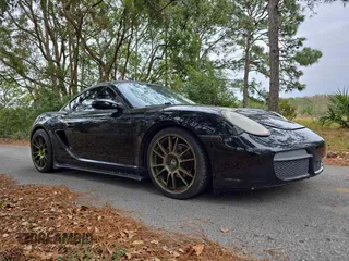 2007 Porsche 718 Cayman z VIN WP0AA29827U763632, wystawiony jako Copart lot #43558415 z przebiegiem 104 245 mil mil oraz Czysty tytuł • Clean title. Historia ofert i sprzedaży dostępna na DreamBid. Obrazek 1.