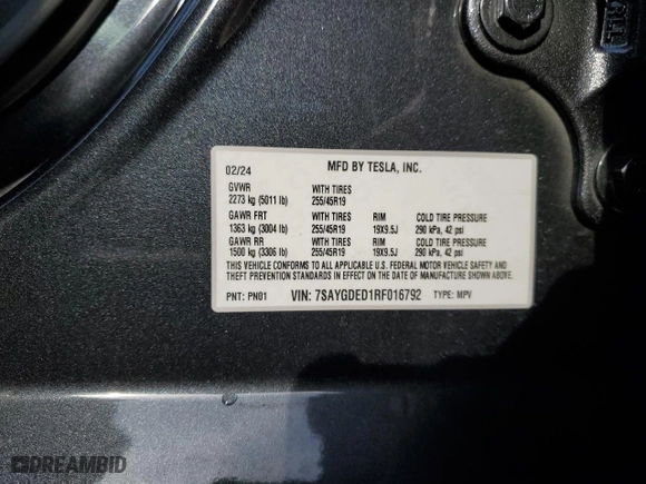 2024 Tesla Model Y with VIN 7SAYGDED1RF016792, listed as a Copart auction lot 50057345 with 6,749 mi miles and Salvage Title. Bid and sale history available at carsss.com. Image 13.