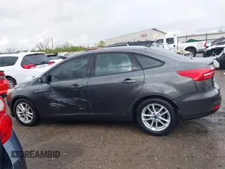 2015 Ford Focus SE with VIN 1FADP3F28FL219552, listed as a IAAI auction lot 41959648 with 128,590 mi miles. Bid and sale history available at carsss.com. Image 14.