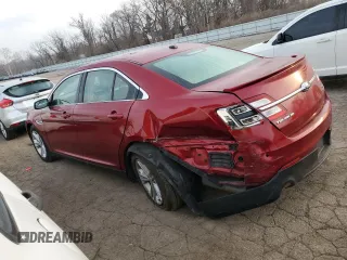 2014 Ford Taurus SEL with VIN 1FAHP2E8XEG123009, listed as a Copart auction lot 42724724 with 117,639 mi miles and Salvage Title. Bid and sale history available at DreamBid. Image 2.