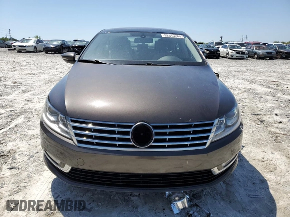 2013 Volkswagen CC Lux with VIN WVWRN7AN4DE546711, listed as a Copart auction lot 52673205 with 106,700 mi miles and Salvage Title. Bid and sale history available at DreamBid. Image 5.