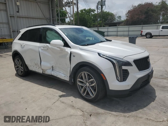 2020 Cadillac XT4 FWD Sport with VIN 1GYFZER49LF123830, listed as a Copart auction lot 55737985 with 98,871 mi miles and Salvage title. Bid and sale history available at DreamBid. Image 4.