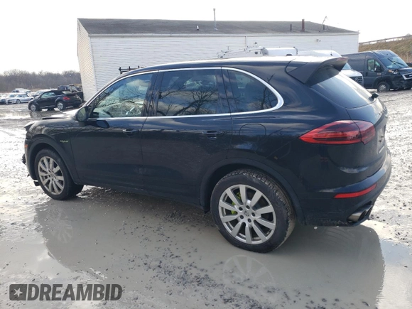 2016 Porsche Cayenne S E-Hybrid z VIN WP1AE2A29GLA17128, wystawiony jako Copart lot #87010884 z przebiegiem 130 895 mil mil oraz Szkoda całkowita • Salvage title. Historia ofert i sprzedaży dostępna na DreamBid. Obrazek 2.