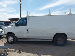 2014 Ford Econoline Cargo Commercial z VIN 1FTNE2EW6EDA19961, wystawiony jako IAAI lot #42370572 z przebiegiem 107 320 mil mil oraz . Historia ofert i sprzedaży dostępna na DreamBid. Obrazek 14.