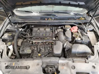 2015 Ford Taurus SEL с VIN 1FAHP2H82FG170371, выставлен на аукционе Copart как лот 60748625 с пробегом 187 305 миль миль и На запчасти • Non repairable. История ставок и продаж доступна на DreamBid. Изображение 11.