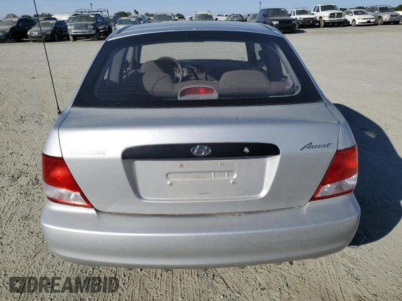 2002 Hyundai Accent с VIN KMHCF35G62U203274, выставлен на аукционе Copart как лот 77047834 с пробегом 90 442 миль миль и Списание • Salvage title. История ставок и продаж доступна на DreamBid. Изображение 6.