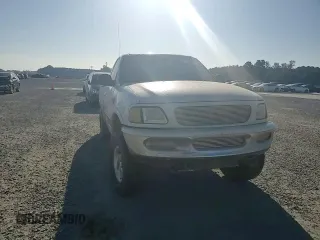 1998 Ford F-150 with VIN 1FTZF18W3WNB98041, listed as a Copart auction lot 77530824 with 194,712 mi miles and Salvage title. Bid and sale history available at DreamBid. Image 11.