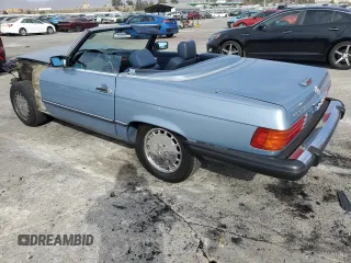 1988 Mercedes-Benz 560 SL with VIN WDBBA48D8JA090190, listed as a Copart auction lot 85241444 with 197,013 mi miles and Salvage Title. Bid and sale history available at carsss.com. Image 2.