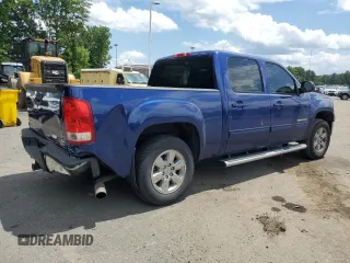 2013 GMC Sierra 1500 SLT with VIN 3GTP2WE77DG161822, listed as a Copart auction lot 63851855 with 169,146 mi miles and Salvage title. Bid and sale history available at DreamBid. Image 3.
