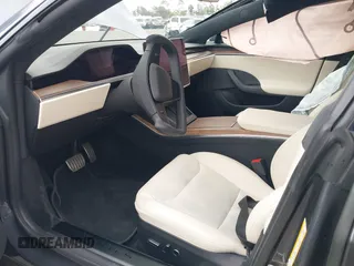 2021 Tesla Model S Long Range с VIN 5YJSA1E57MF441387, выставлен на аукционе IAAI как лот 42034307 с пробегом Не указан миль и . История ставок и продаж доступна на DreamBid. Изображение 5.