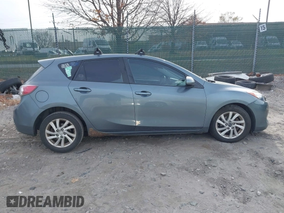 2012 Mazda Mazda3 i Touring with VIN JM1BL1L81C1651952, listed as a IAAI auction lot 40863599 with 242,296 mi miles. Bid and sale history available at carsss.com. Image 13.