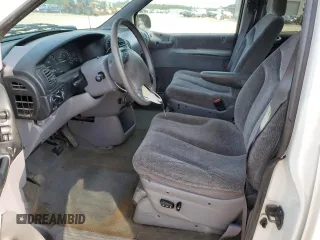 1999 Plymouth Voyager Grand SE z VIN 1P4GP44G7XB592371, wystawiony jako Copart lot #65111334 z przebiegiem 119 548 mil mil oraz Szkoda całkowita • Salvage title. Historia ofert i sprzedaży dostępna na DreamBid. Obrazek 7.