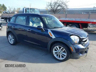 2014 MINI Countryman with VIN WMWZB3C50EWR42268, listed as a IAAI auction lot 41845750 with 117,192 mi miles and . Bid and sale history available at DreamBid. Image 1.