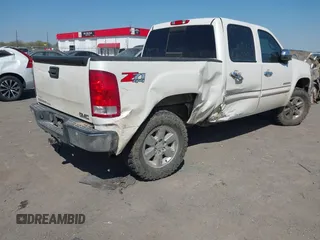 2012 GMC Sierra 1500 SLE with VIN 3GTP2VE77CG207786, listed as a IAAI auction lot 41865391 with 157,780 mi miles and . Bid and sale history available at DreamBid. Image 4.