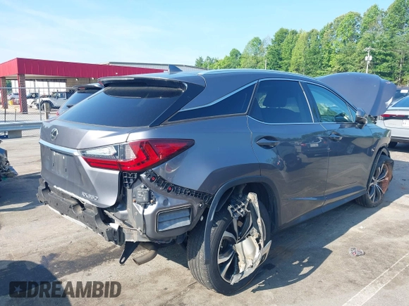 2017 Lexus RX 350 with VIN 2T2BZMCA4HC074707, listed as a IAAI auction lot 42439938 with 127,240 mi miles and . Bid and sale history available at DreamBid. Image 4.