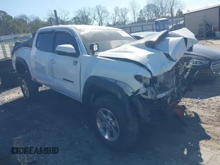 2018 Toyota Tacoma SR with VIN 5TFCZ5AN6JX144056, listed as a IAAI auction lot 41623760 with Not Provided miles and . Bid and sale history available at DreamBid. Image 1.