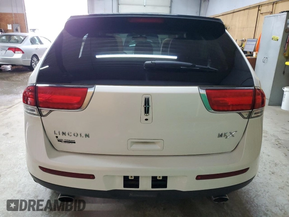 2012 Lincoln MKX z VIN 2LMDJ6JK9CBL02245, wystawiony jako Copart lot #53363515 z przebiegiem 130 227 mil mil oraz Czysty tytuł • Clean title. Historia ofert i sprzedaży dostępna na DreamBid. Obrazek 6.