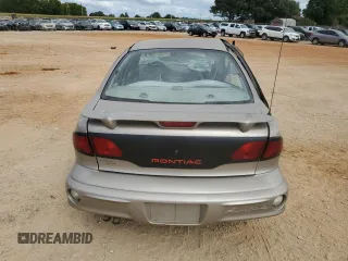 2002 Pontiac Sunfire SE z VIN 1G2JB524027308408, wystawiony jako Copart lot #61752784 z przebiegiem Nie podano mil oraz Szkody całkowita. Historia ofert i sprzedaży dostępna na DreamBid. Obrazek 6.