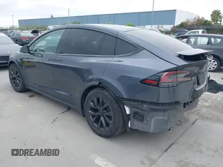 2022 Tesla Model X Plaid with VIN 7SAXCBE6XNF337687, listed as a IAAI auction lot 42035097 with 18,756 mi miles and . Bid and sale history available at DreamBid. Image 3.