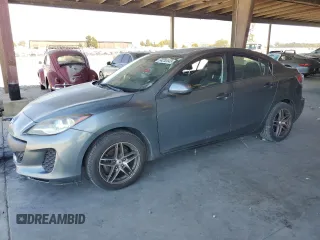 2012 Mazda 3 i Grand Touring with VIN JM1BL1W88C1554906, listed as a Copart auction lot 64253045 with 184,331 mi miles and Clean title. Bid and sale history available at DreamBid. Image 1.