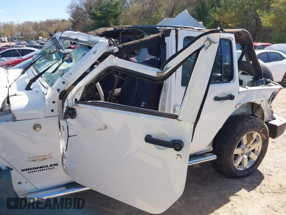 2013 Jeep Wrangler Unlimited Moab with VIN 1C4HJWEG7DL569862, listed as a IAAI auction lot 42095535 with Not provided miles and . Bid and sale history available at DreamBid. Image 12.
