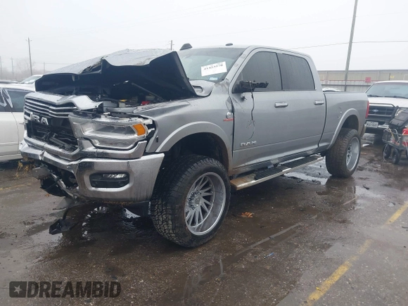 2021 Ram 2500 Laramie z VIN 3C6UR5FL7MG606281, wystawiony jako IAAI lot #41453570 z przebiegiem 73 755 mil mil oraz . Historia ofert i sprzedaży dostępna na DreamBid. Obrazek 17.