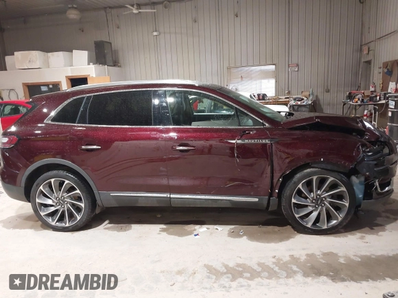 2019 Lincoln Nautilus Reserve z VIN 2LMPJ8L92KBL42653, wystawiony jako IAAI lot #41887906 z przebiegiem 52 450 mil mil oraz . Historia ofert i sprzedaży dostępna na DreamBid. Obrazek 13.