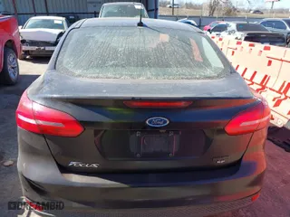 2018 Ford Focus SE with VIN 1FADP3F21JL259271, listed as a IAAI auction lot 41689494 with 94,190 mi miles. Bid and sale history available at carsss.com. Image 16.