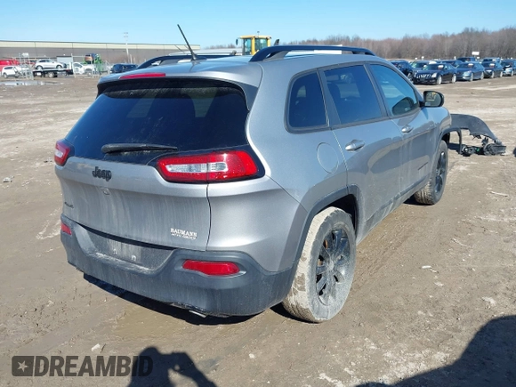 2014 Jeep Cherokee Latitude with VIN 1C4PJMCS7EW310179, listed as a IAAI auction lot 41757831 with 134,087 mi miles and . Bid and sale history available at DreamBid. Image 4.