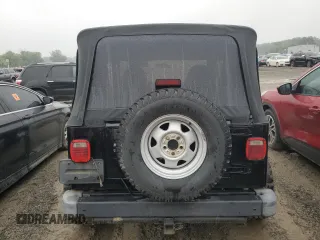 1999 Jeep Wrangler SE with VIN 1J4FY29P3XP408468, listed as a Copart auction lot 55537335 with Not provided miles and Salvage title. Bid and sale history available at DreamBid. Image 6.