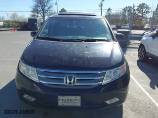2013 Honda Odyssey Touring with VIN 5FNRL5H99DB076385, listed as a IAAI auction lot 41751504 with 233,875 mi miles. Bid and sale history available at carsss.com. Image 12.