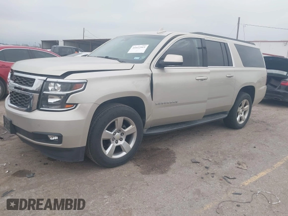 2015 Chevrolet Suburban LT with VIN 1GNSCJKC4FR744208, listed as a IAAI auction lot 41612915 with 87,445 mi miles and . Bid and sale history available at DreamBid. Image 17.