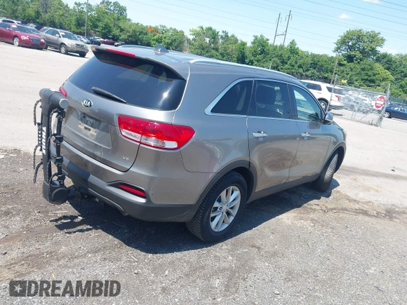 2016 Kia Sorento LX with VIN 5XYPGDA52GG044582, listed as a IAAI auction lot 42402596 with 143,250 mi miles and . Bid and sale history available at DreamBid. Image 4.