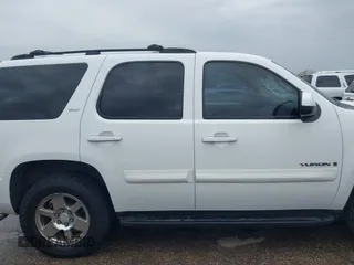 2009 GMC Yukon SLT w/4SA with VIN 1GKFK33049R153415, listed as a IAAI auction lot 41896770 with 182,256 mi miles. Bid and sale history available at carsss.com. Image 13.