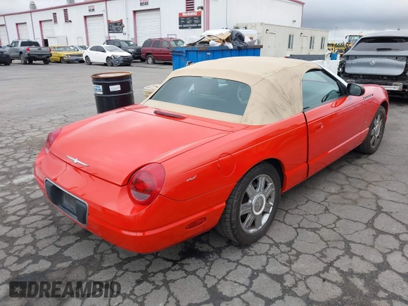 2004 Ford Thunderbird Deluxe z VIN 1FAHP60A14Y106397, wystawiony jako IAAI lot #41466275 z przebiegiem 146 214 mil mil oraz . Historia ofert i sprzedaży dostępna na DreamBid. Obrazek 4.