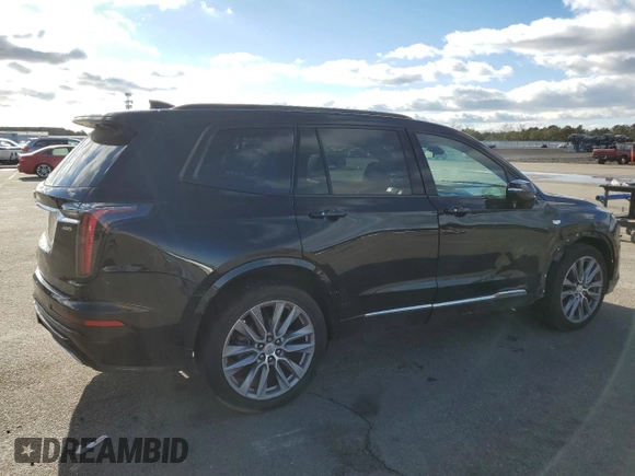 2021 Cadillac XT6 Sport z VIN 1GYKPGRS0MZ215942, wystawiony jako Copart lot #84830084 z przebiegiem 29 930 mil mil oraz Szkoda całkowita • Salvage title. Historia ofert i sprzedaży dostępna na DreamBid. Obrazek 3.
